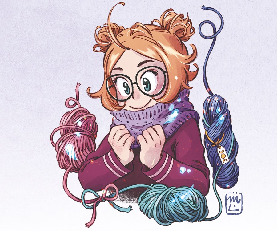 Elfie emmitouflée dans son snood, entourée de pelotes de laine